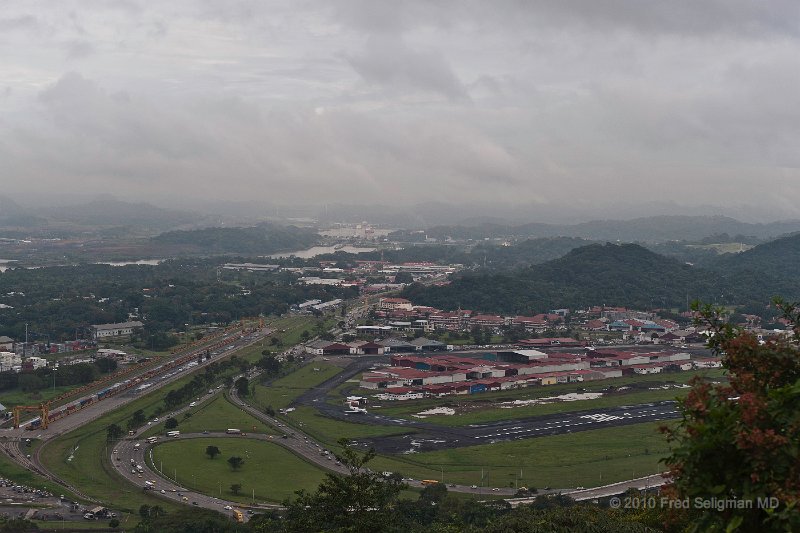20101202_095433 D3.jpg - Anjon Hill provides a spectaular view of the Canal and city.  This was taken on a somewhat hazy day. One can still see the Miraflores Locks of the Panama Canal in the distance.  The airstrip is now a local airport but prior to 1999 was part of the US Canal Zone